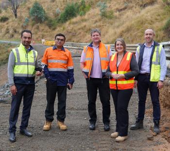 Engineers and Mayor at landslip site