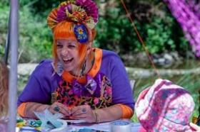 Jewellery maker Sarah Seahorse smiling at a table